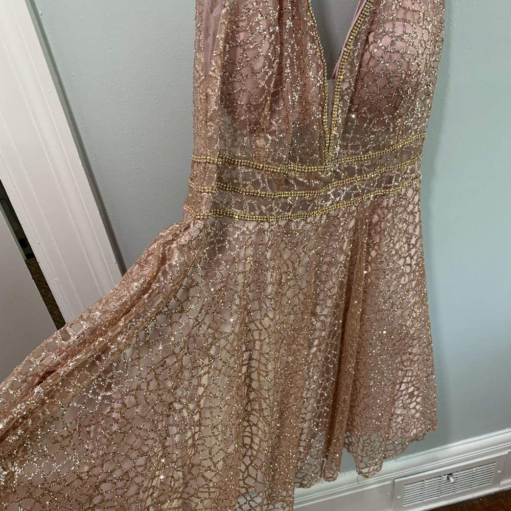 Gorgeous, Fiesta Fashions Rose Gold Prom dress.